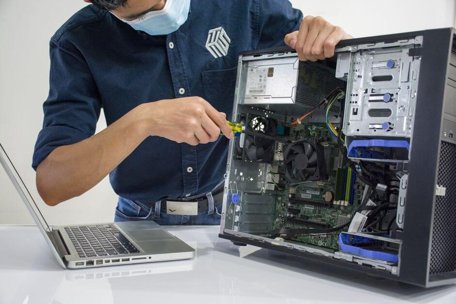 support on site IT technician helping business owner with hardware