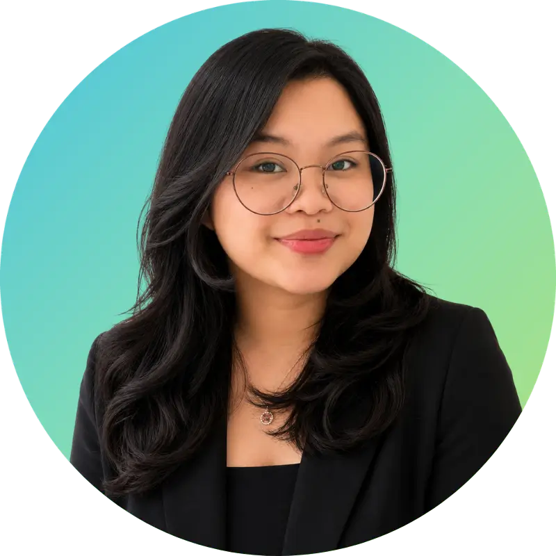 Carl is a woman with long dark hair, glasses, and a black blazer, set against a blue-green gradient background.
